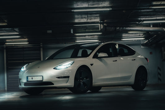 a white car parked in a garage