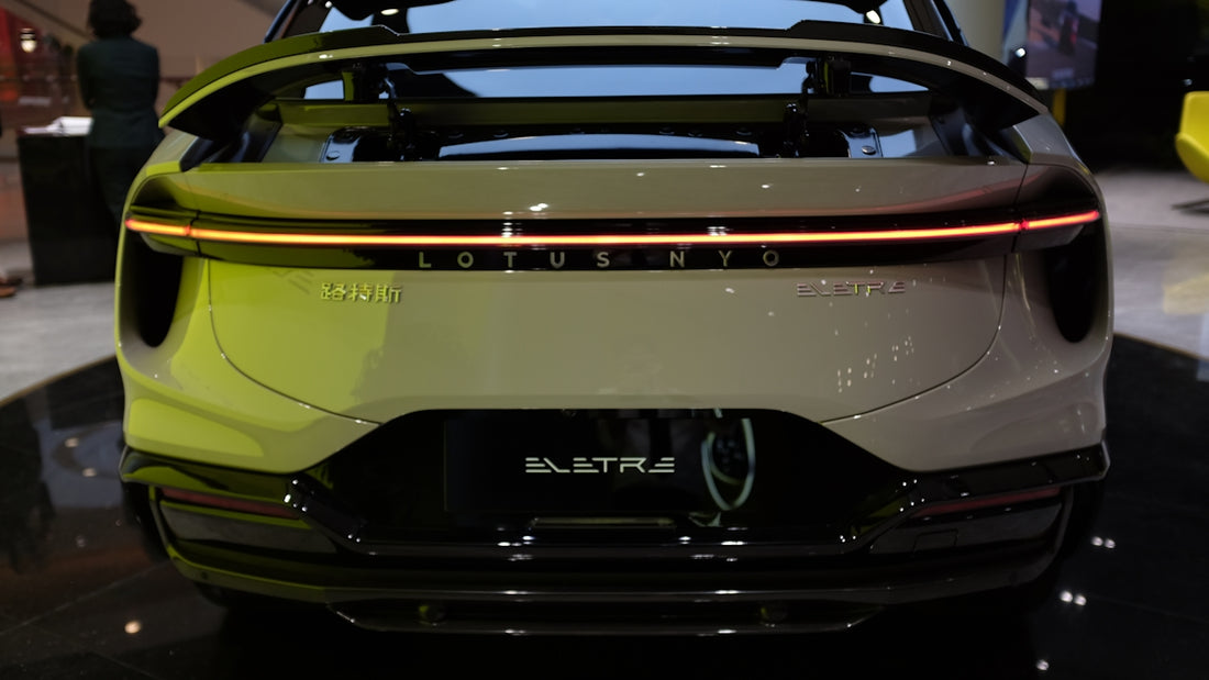 the rear end of an electric car on display