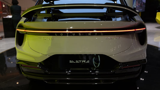 the rear end of an electric car on display