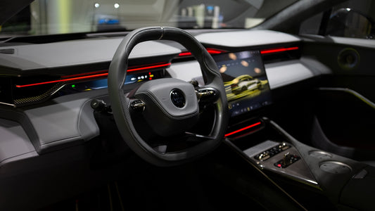the interior of a car with a steering wheel